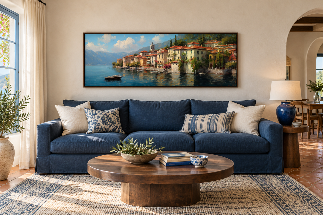 Bellagio Lake Como framed canvas wall art above a blue sofa in a Mediterranean-style living room.