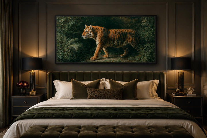 Bengal tiger canvas print in a cinematic format hanging above a bed in a dark, modern bedroom.