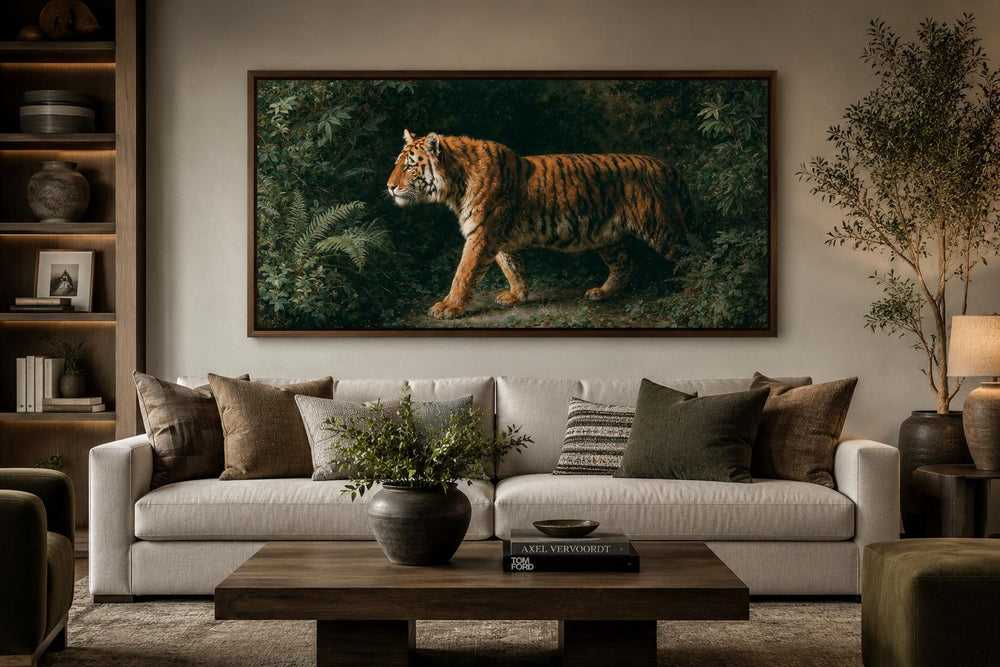 Bengal tiger canvas print in a cinematic jungle scene above a modern living room sofa.
