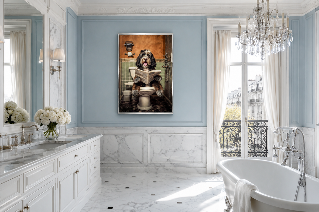 Bernedoodle dog reading a newspaper on a toilet framed canvas wall art in a marble bathroom.
