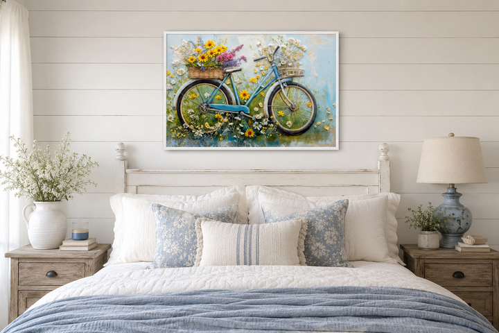 Floral bicycle rustic farmhouse framed canvas wall art hanging above a bed in a cozy bedroom.