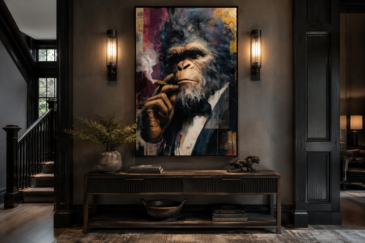 Bigfoot smoking cigar framed canvas wall art in a suit, displayed in a dark, modern entryway.