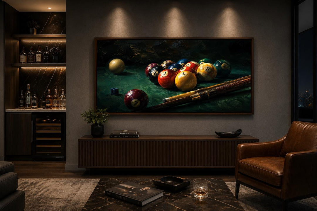Billiard balls canvas print on a wall in a dark, modern room with leather seating and a home bar.