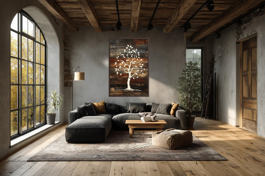 Vertical canvas wall art of a white birch tree against a rustic, dark wood plank background.