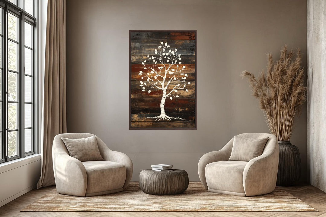 Vertical canvas wall art of a white birch tree on rustic wood planks in a modern living room.