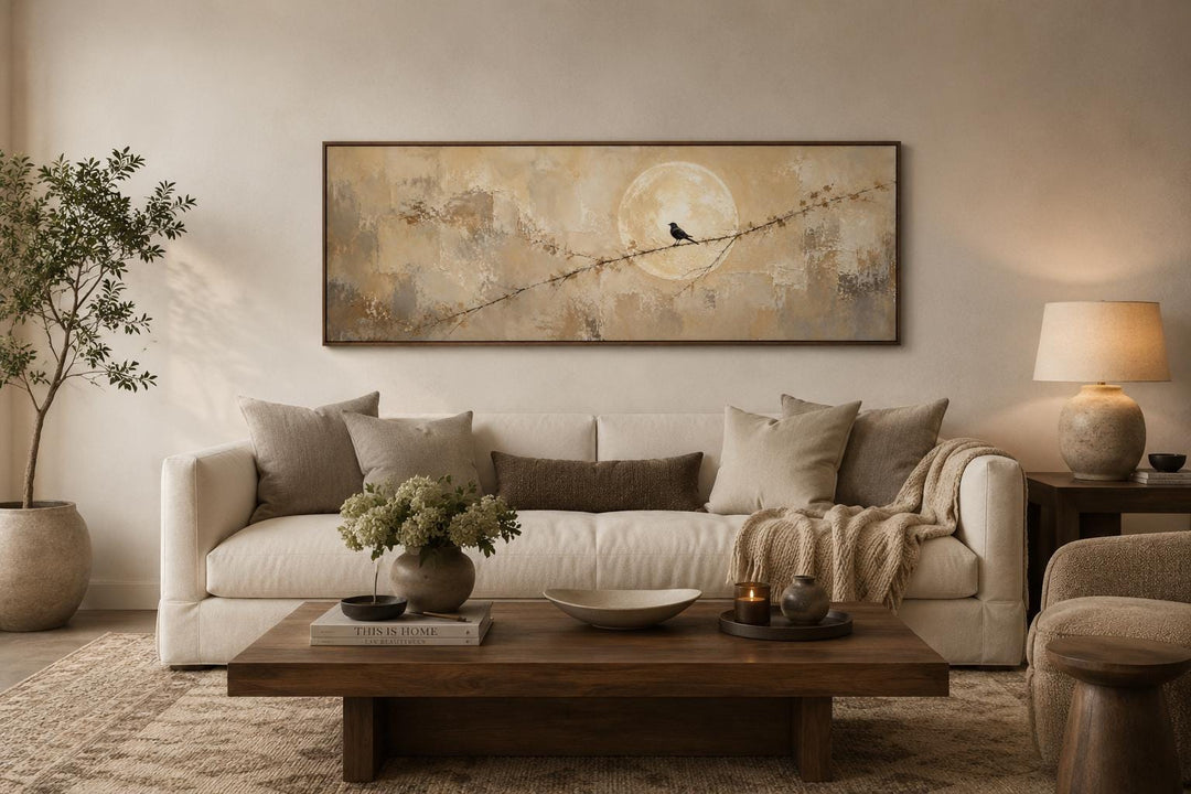 Bird on Branch Silhouette With Moon Neutral Beige Abstract Above Bed Canvas Print in a living room.
