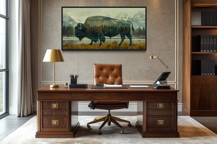 Bison in Yellowstone double exposure canvas wall art above a wooden desk in a home office.
