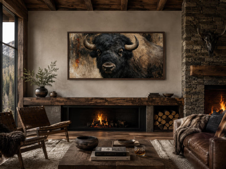Large horizontal canvas print of a bison head in a rustic living room with a stone fireplace.