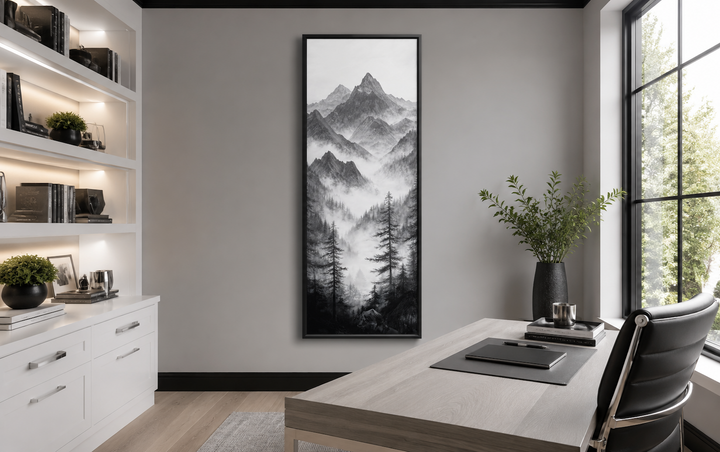 Black and white long vertical canvas wall art of a foggy mountain forest in a modern office.