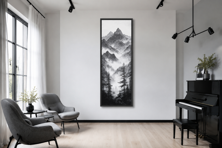 Long vertical black and white canvas wall art of a foggy mountain forest in a modern living room.