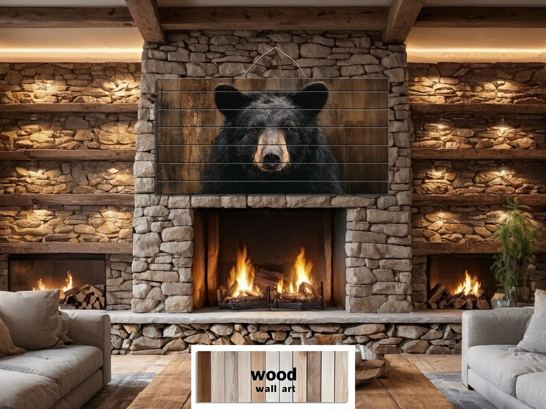 Rustic horizontal wood wall art featuring a close-up portrait of a black bear over a fireplace.