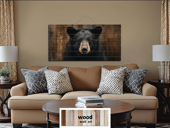 Large horizontal wood wall art featuring a realistic black bear portrait on rustic timber planks.