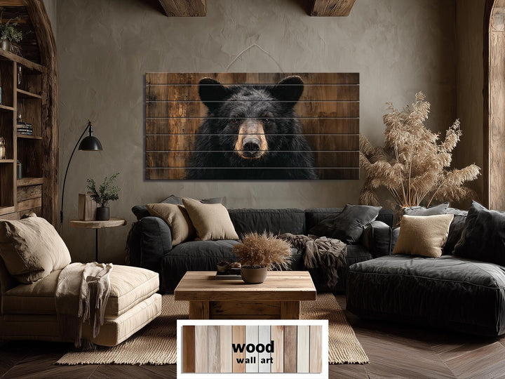 Large horizontal wood wall art featuring a rustic black bear portrait on natural timber planks.