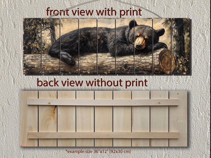 Black bear sleeping on a log printed on a multi-panel distressed wood wall art piece.