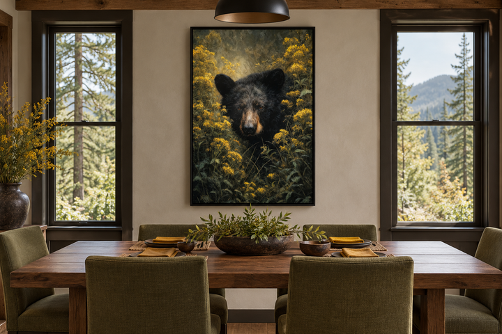 Black bear in yellow wildflowers framed canvas wall art in a rustic dining room.