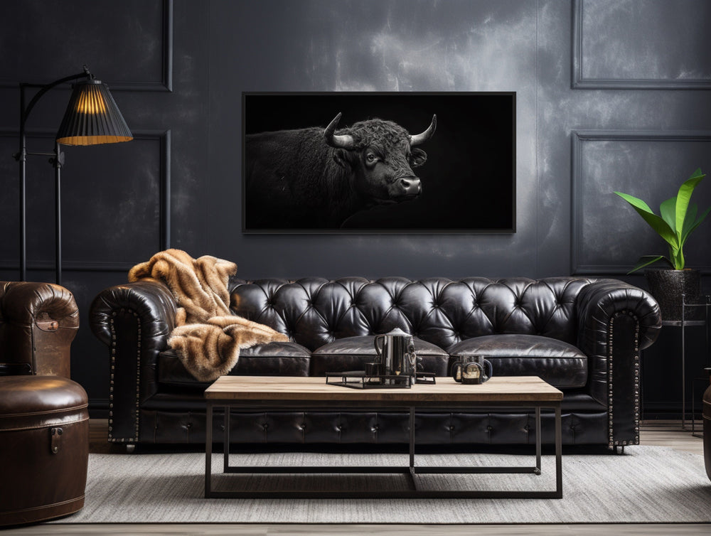 Black Bull Framed Canvas Wall Art in a living room with a leather couch