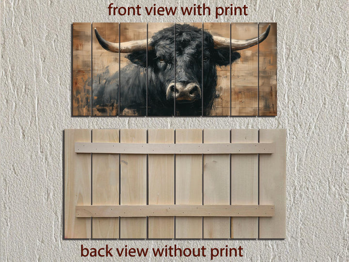 Black bull portrait printed on horizontal wooden planks for rustic western wall decor.