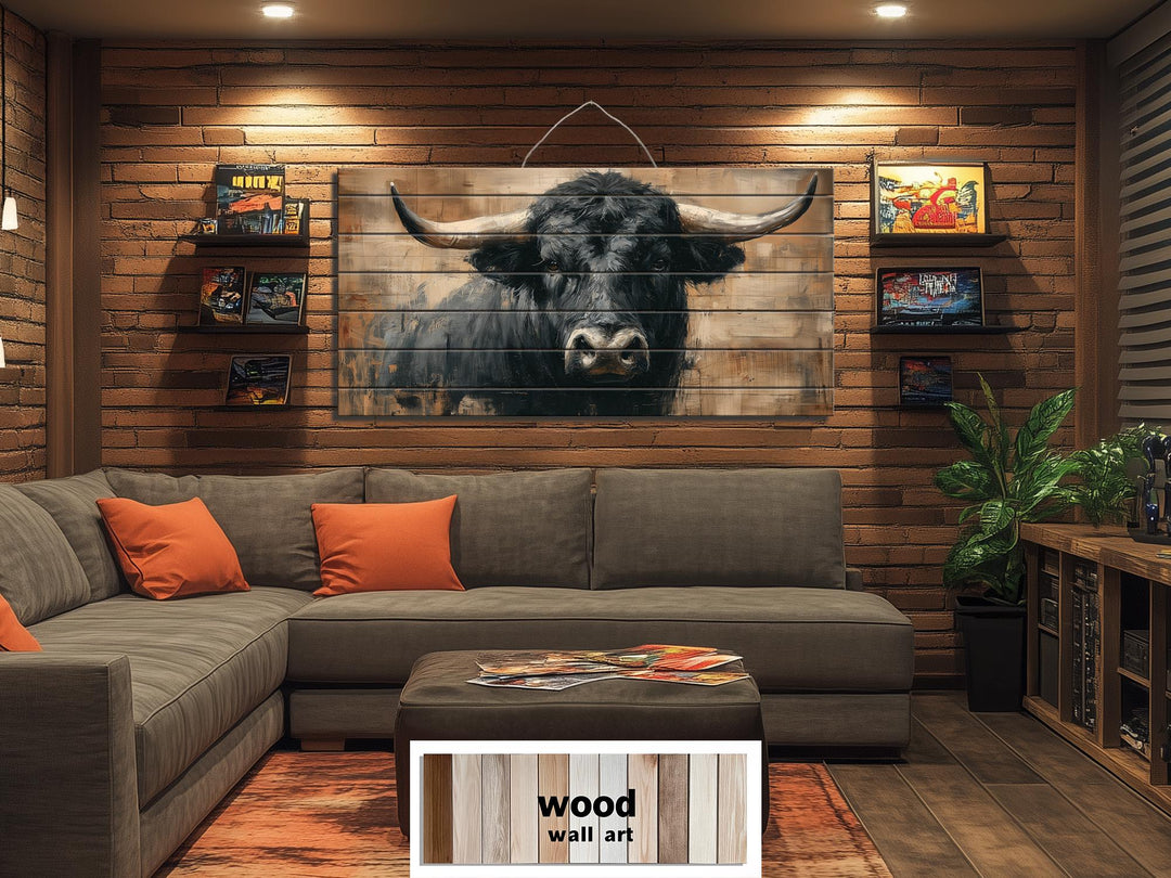 Large horizontal wood wall art featuring a realistic black bull portrait in a rustic living room.