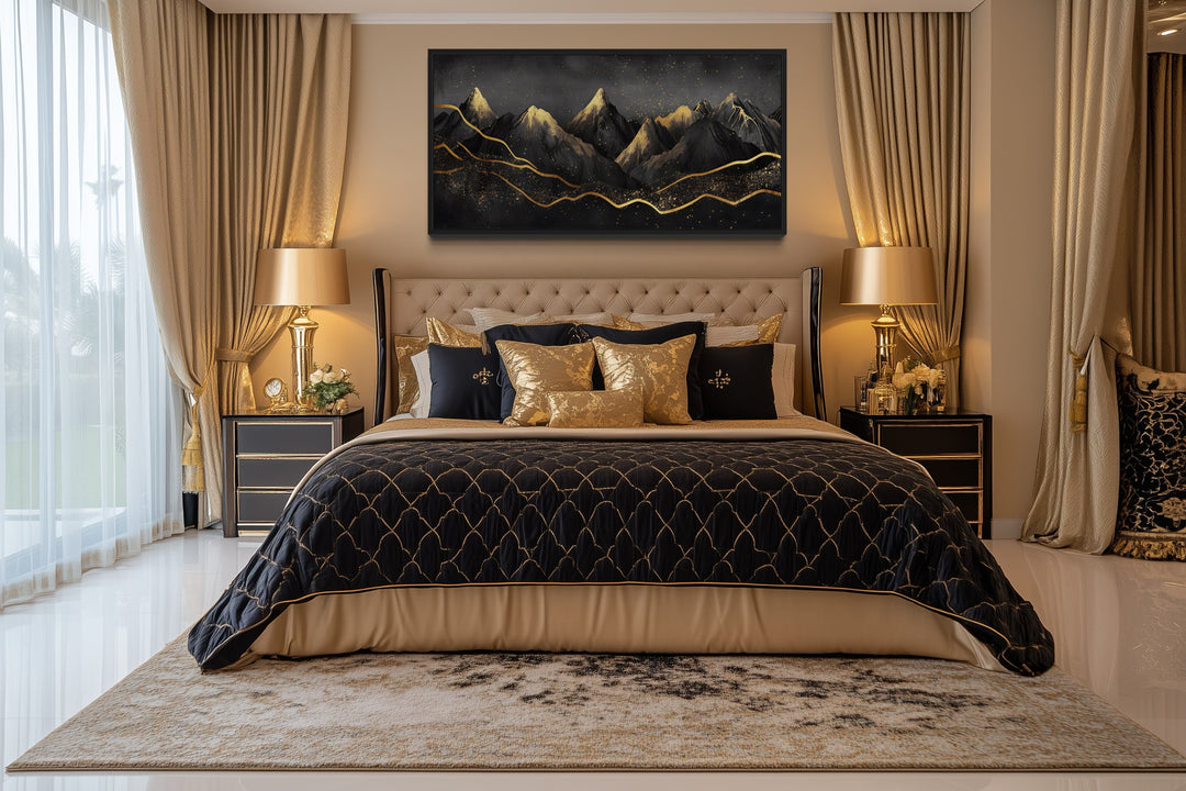 Black and gold abstract mountain framed canvas wall art hanging above a bed in a modern bedroom.