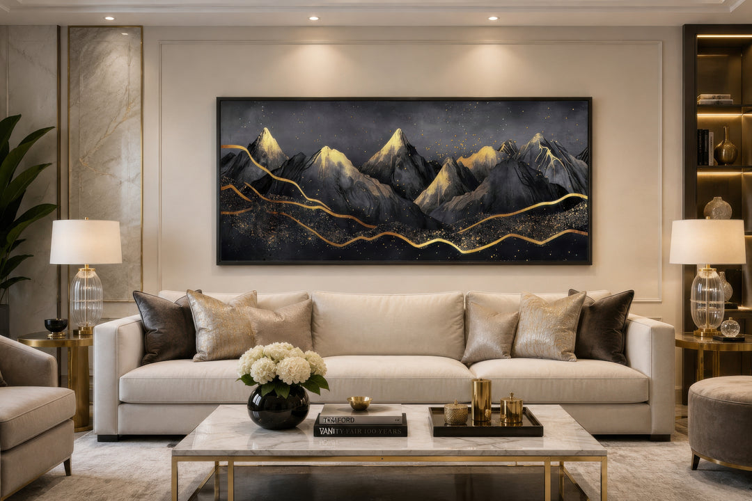 Black Gold Abstract Mountain Framed Canvas Wall Art hanging above a sofa in a modern living room.