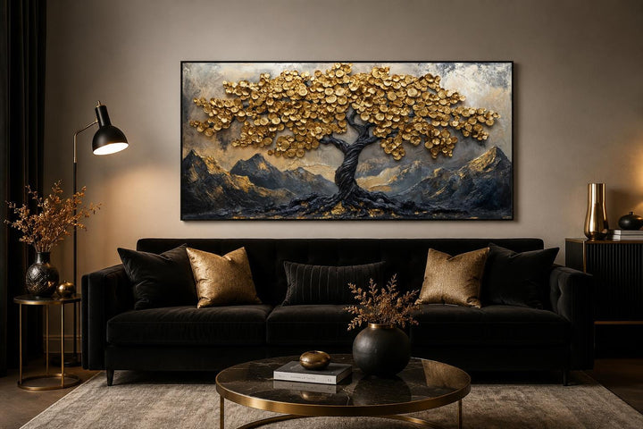 Black and gold Feng Shui money tree framed canvas wall art above a black sofa in a modern room.