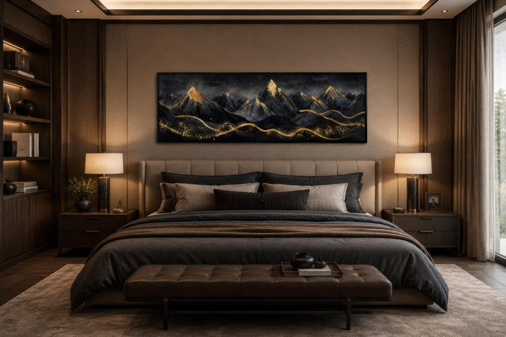 Black and gold mountain landscape canvas art hanging above a bed in a modern bedroom.