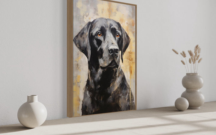 Black Lab Abstract Portrait Canvas Wall Art in a slim wood frame on a neutral wall.