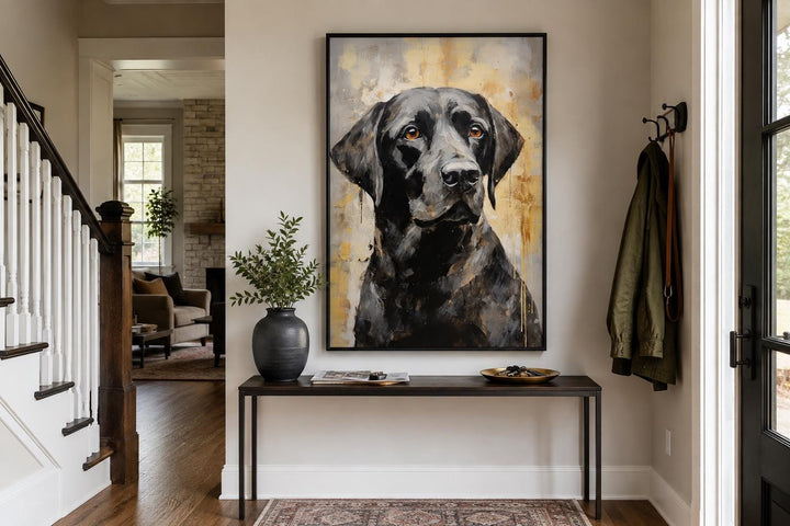 Black Lab Abstract Portrait Canvas Wall Art in a black frame above a console table in an entryway.