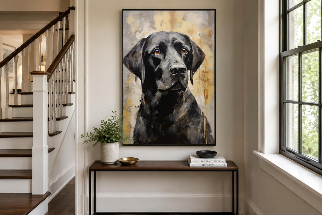 Black Lab Abstract Portrait Canvas Wall Art in a slim black frame above a console table.