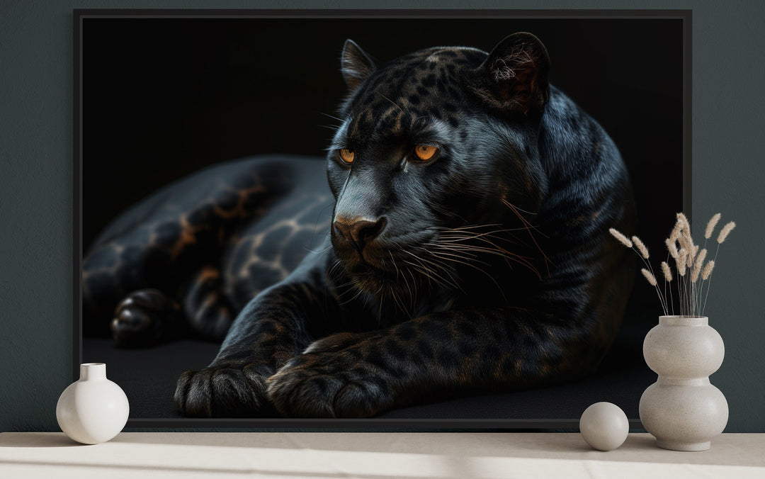 Framed canvas wall art of a black panther on a black background.