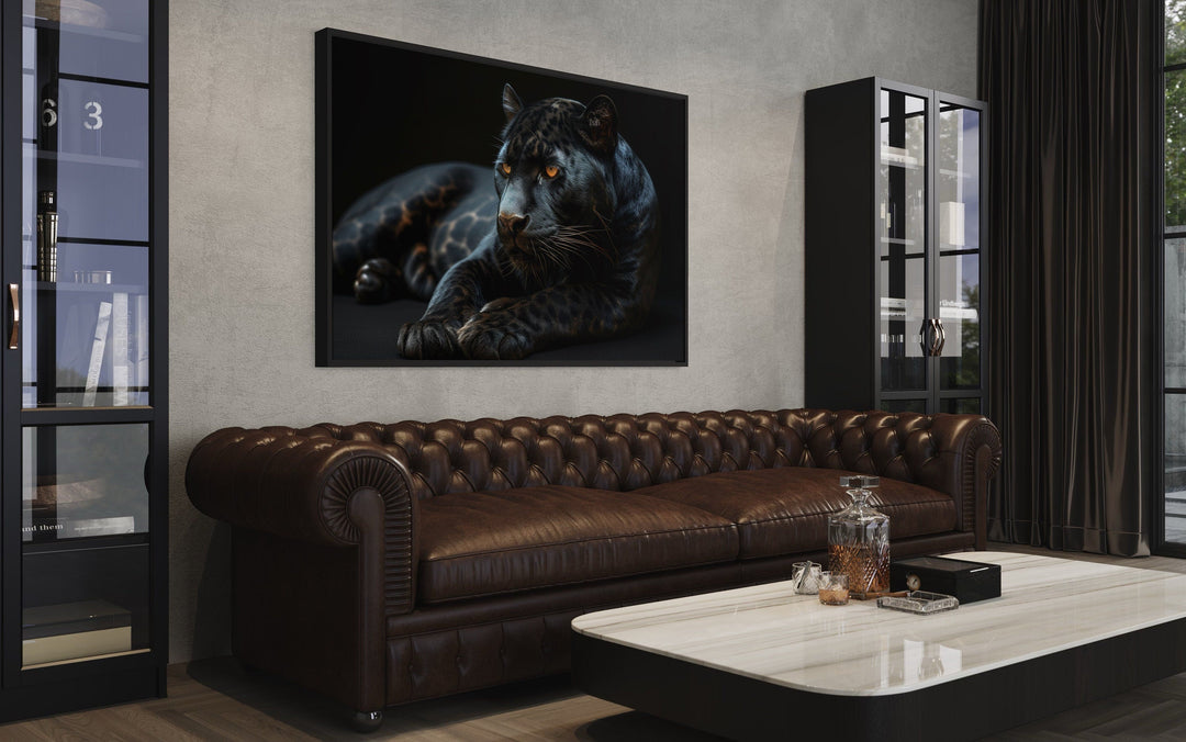 Framed black panther canvas wall art on a black background.