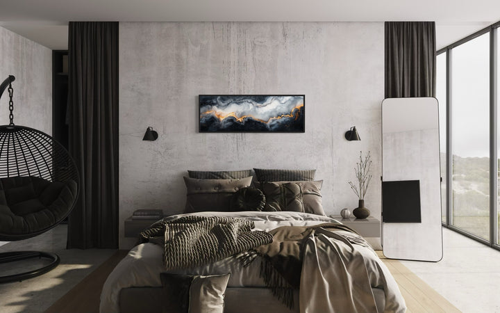 Long horizontal framed canvas wall art with black, white, and gold marble abstract pattern.