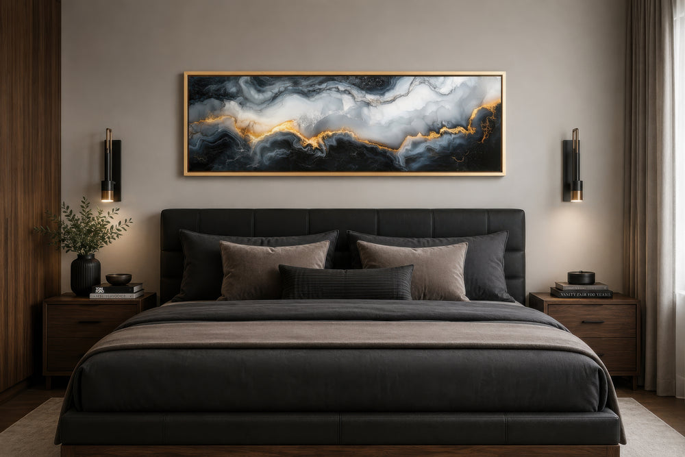 Long horizontal framed canvas wall art with black, white, and gold marble abstract fluid painting.