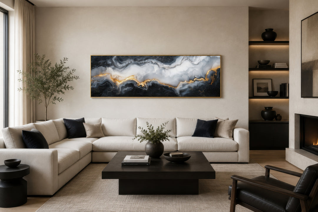 Long horizontal framed canvas wall art with black, white, and gold marble abstract fluid design.
