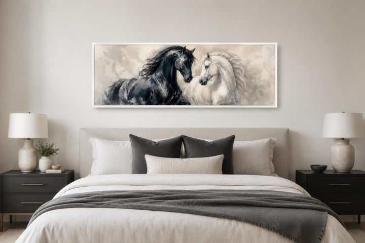 Long horizontal canvas print of a black and white horse in a romantic equestrian style above a bed.