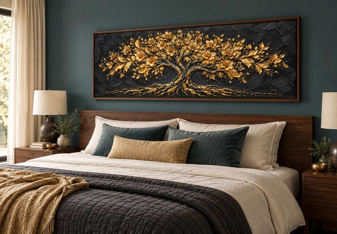 Black and Gold Flowering Tree long horizontal canvas wall art above a bed in a modern bedroom.