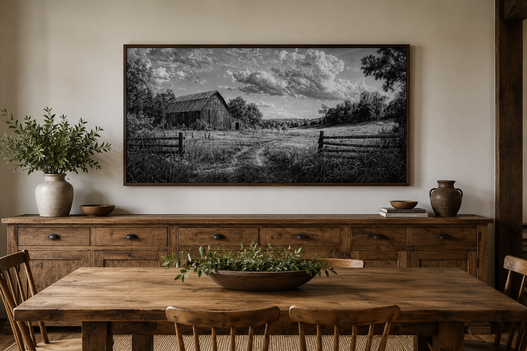 Black and white barn landscape canvas wall art in a rustic farmhouse dining room.