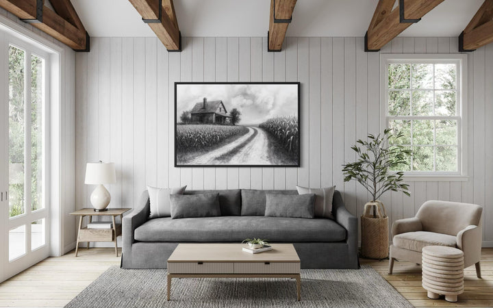 Black and white farmhouse wall art featuring a cornfield landscape canvas print in a rustic room.