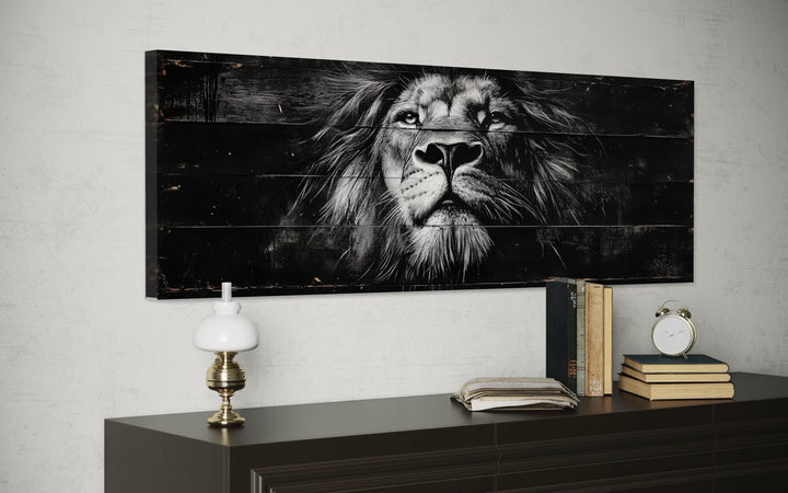 Black and white lion horizontal canvas wall art displayed above a dark wooden dresser.