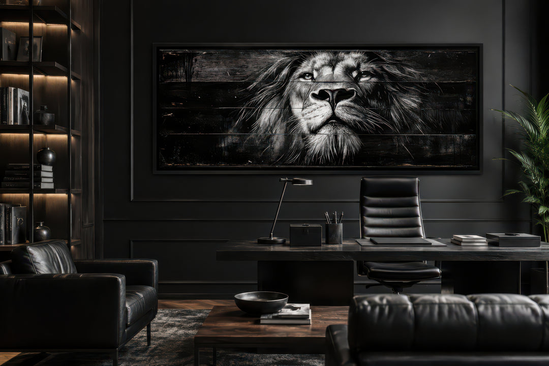 Black and white lion face canvas wall art in a modern dark office setting above a desk.