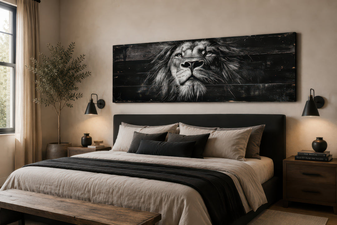 Black and white lion horizontal canvas wall art hanging above a bed in a modern masculine bedroom.
