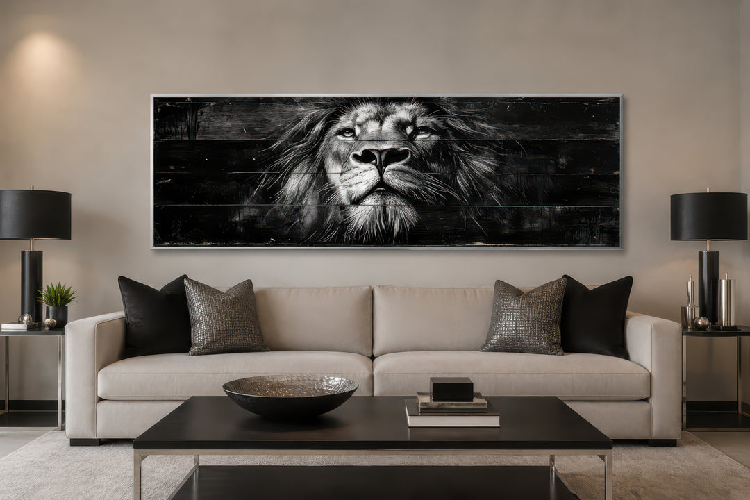 Black and white lion horizontal canvas wall art above a modern sofa in a neutral living room.