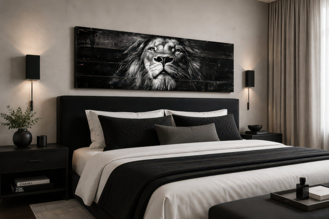 Black and white lion long horizontal canvas wall art mounted above a bed in a modern bedroom.