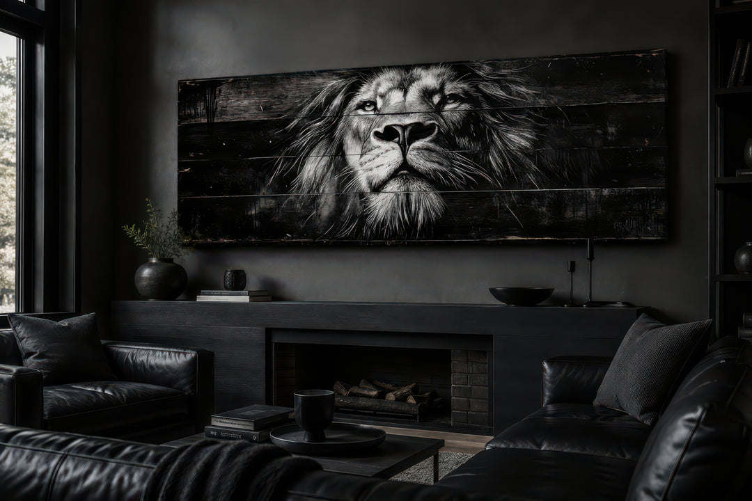 Black and white lion face canvas wall art on a long horizontal frame above a modern fireplace.