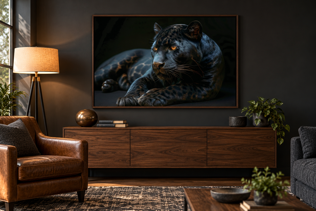 Black panther on black background framed canvas wall art displayed in a modern living room.