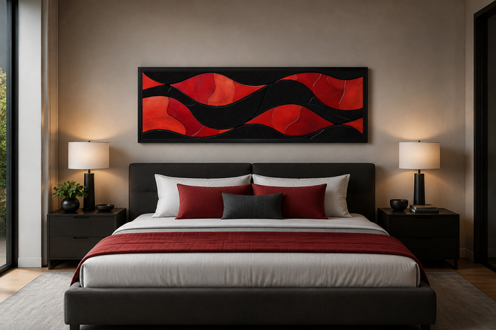 Black and red modern abstract horizontal framed canvas wall art hanging above a bed.