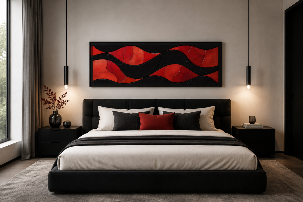 Horizontal framed canvas wall art with red and black abstract waves hanging above a modern bed.