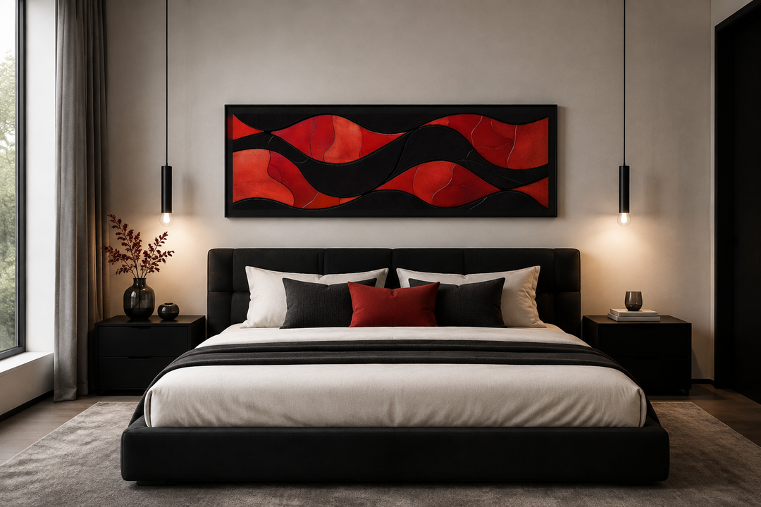Horizontal framed canvas wall art with red and black abstract waves hanging above a modern bed.