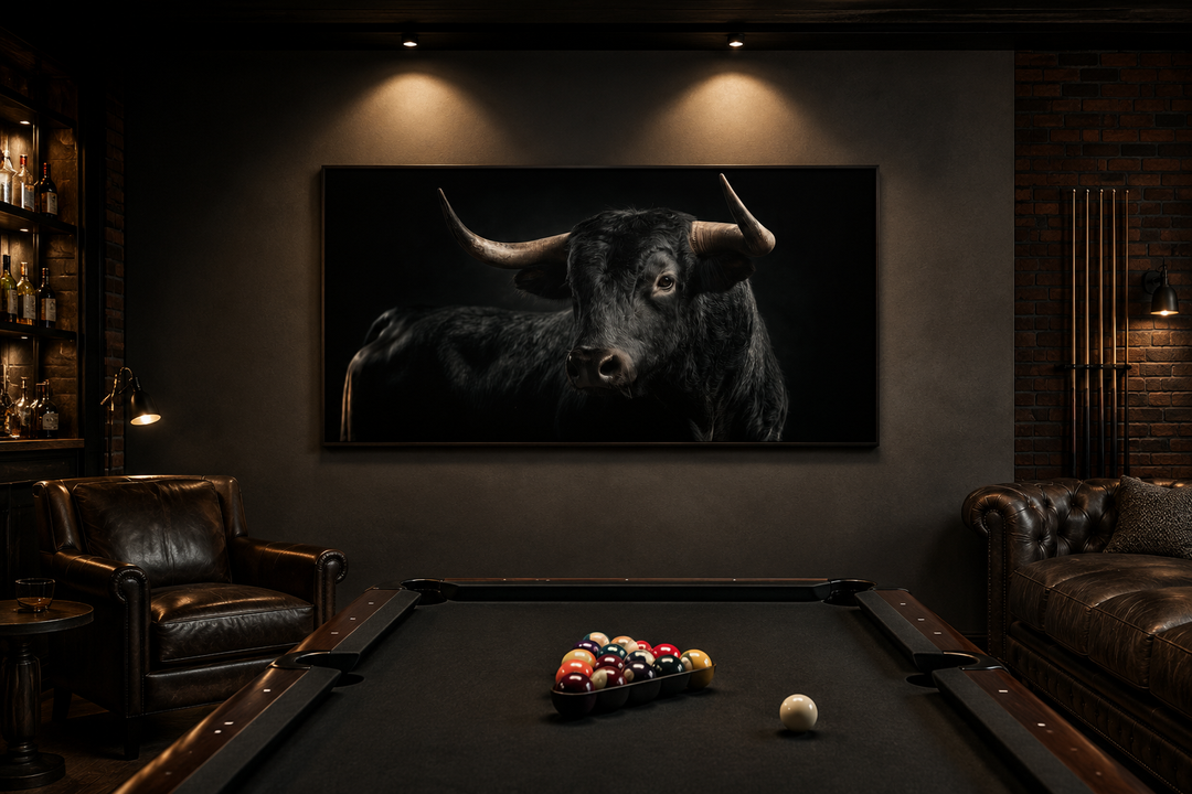 Extra large framed canvas of a black Spanish bull in a masculine office with a pool table.