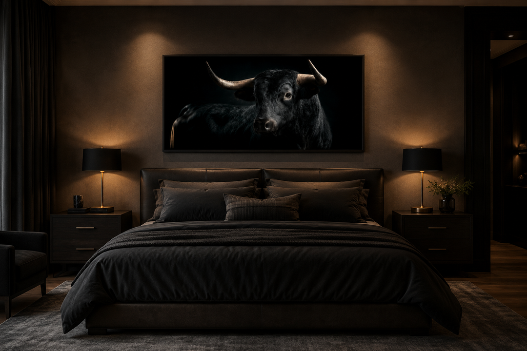 Extra large framed canvas wall art of a black Spanish bull above a bed in a modern bedroom.